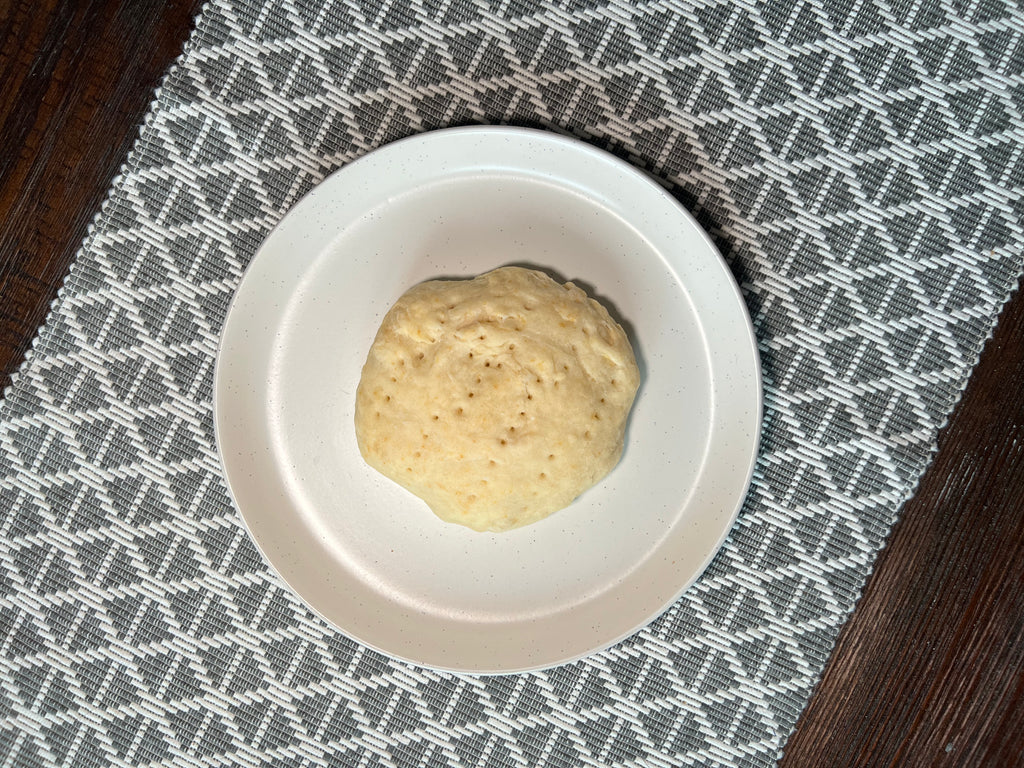 Original flavour baked bannock on a plate.
