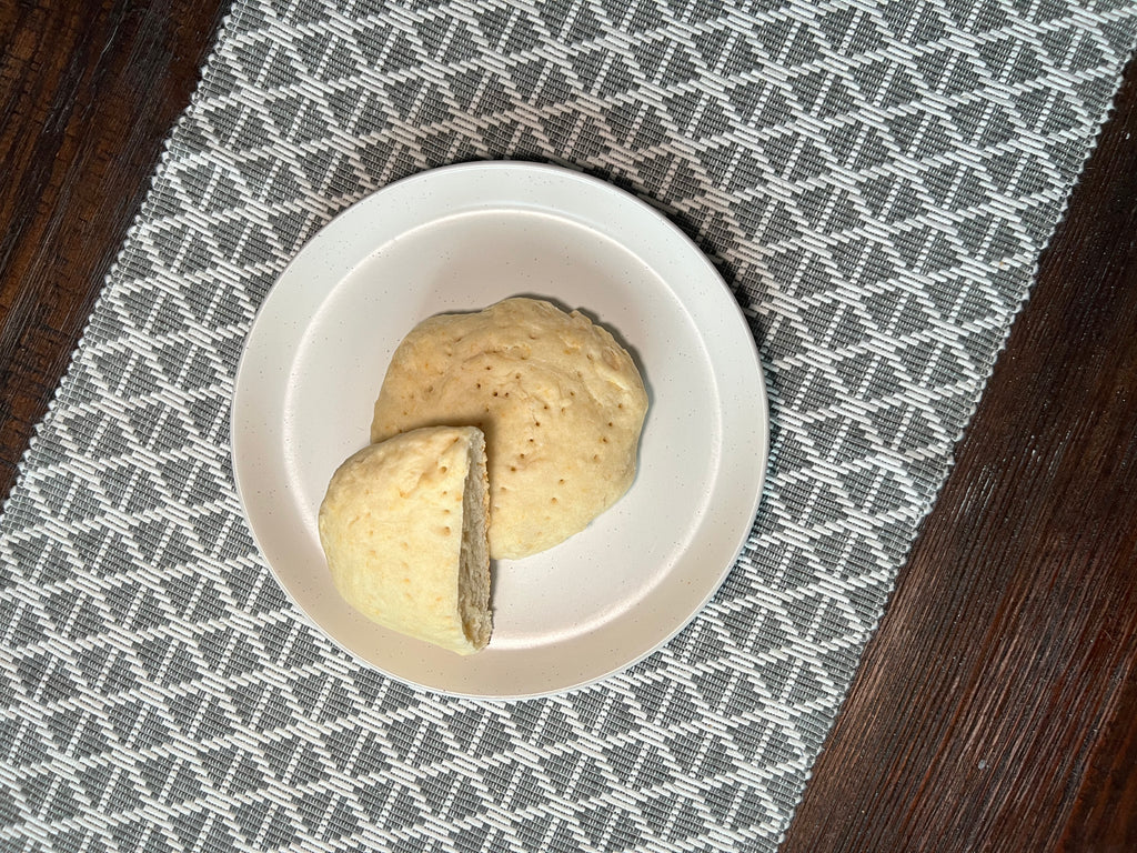 Original flavoured traditional baked bannock, arranged on a plate. 
